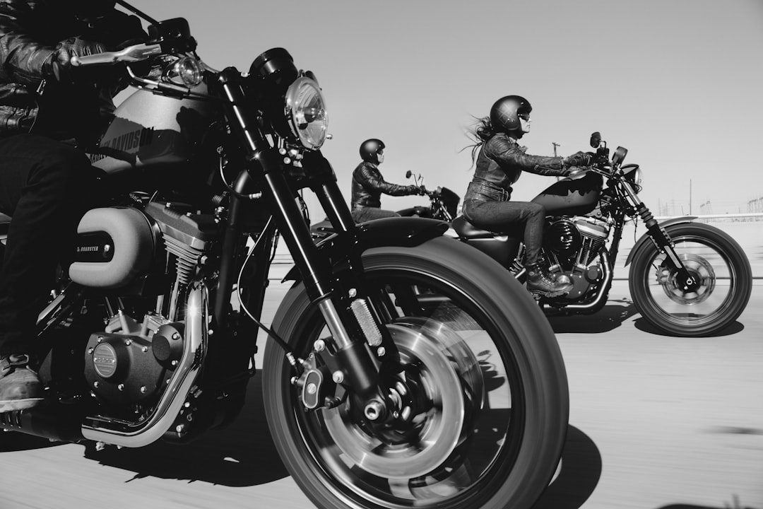 black-and-white-photo-of-people-riding-motorcycle-qd6gvrdfpaa